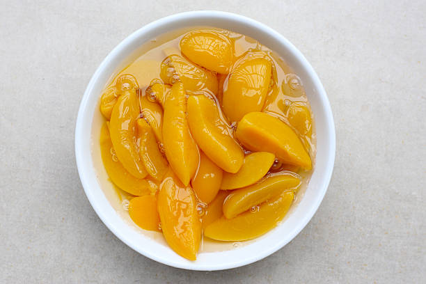 istock Sliced peaches in syrup served in a bowl 2240678902