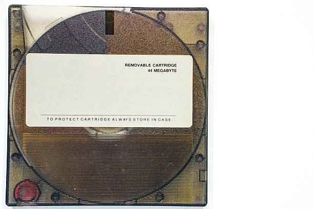 Data storage media: 44 MB removable hard disk cartridge. Vintage portable data storage devices.