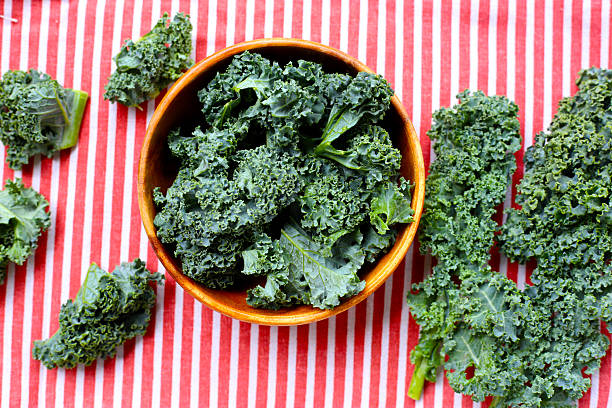 istock Curly kale leaves, Fresh green vegetables 2240679596
