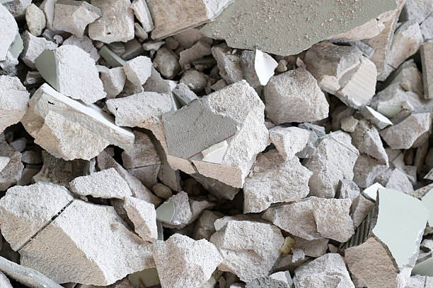 istock Broken concrete, Piles of lightweight construction bricks after house demolition 2240680505