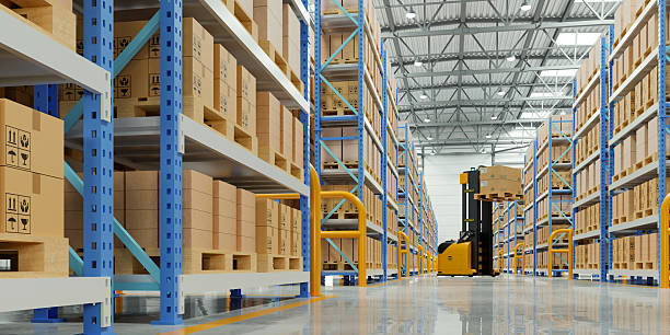 istock Modern logistics warehouse interior with rows of tall shelves and cardboard boxes on pallets, featuring a working forklift for industrial shipping and inventory management- 3D rendering 2240680879