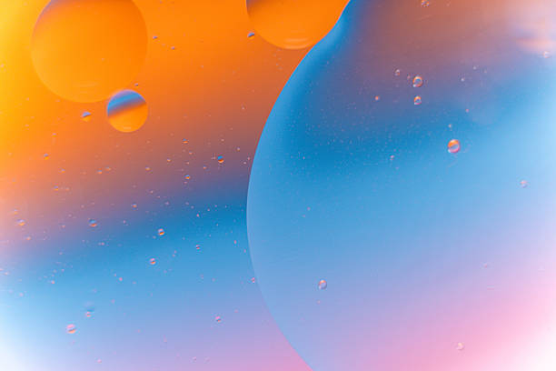 istock Orange and Tosca Pink Fluid Bubbles Abstract Background 2240687790