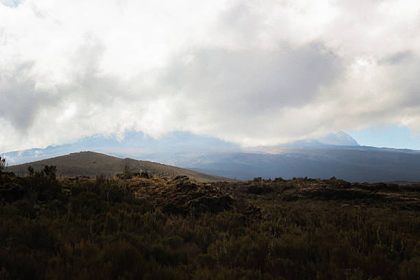 istock Mountain Peak Emerging from the Clouds — Shira Plateau 2240691578