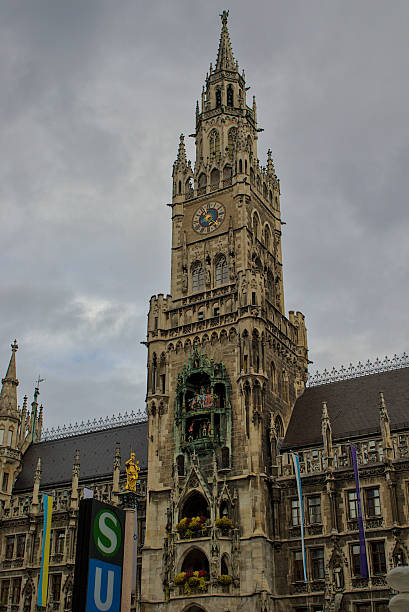 istock Munich's New Town Hall, a stunning building with its ornate Gothic facade, rises beneath a cloudy sky. 2240691955