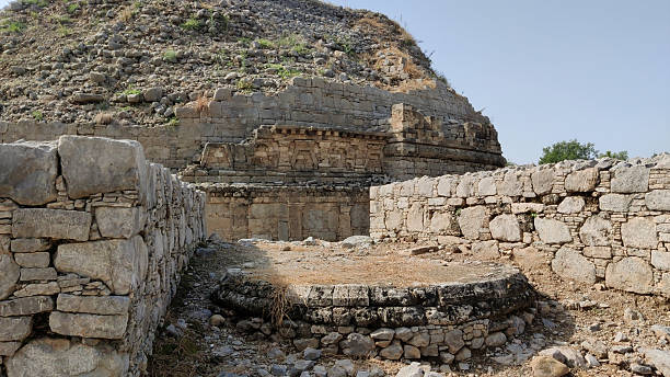 istock Ancient small stupas and monastic rooms surrounding Dharmarajika Stupa showcasing Gandhara Buddhist heritage 2240691968