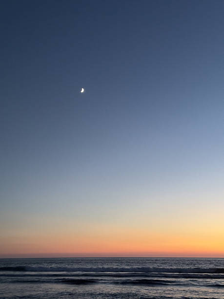 istock Rising Moon Over the Sea in Soft Carlsbad Twilight 2240693763