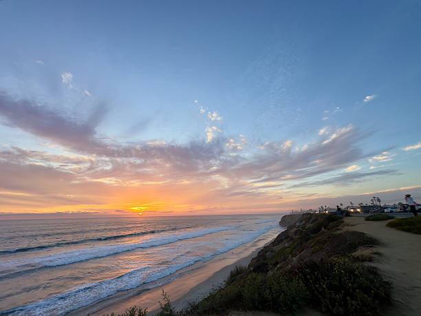 istock Golden Sunset Orb Descending into the Pacific Ocean 2240693945