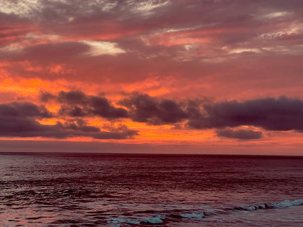 istock Broad Orange Twilight Sky Over the Sea (Horizontal) 2240694077