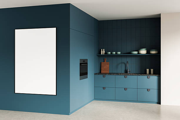 istock Modern kitchen interior with blue cabinets and blank poster mockup on wall for contemporary design presentation and minimalist home styling concept. 3D Rendering 2240695067