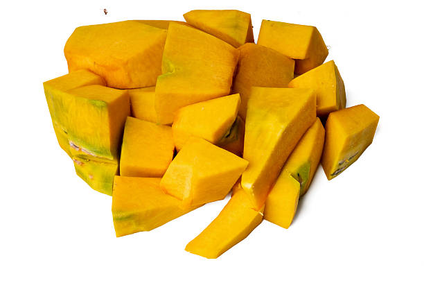 The Photo of slice pumpkin taken with a high-resolution camera using the focus-stacking technique on a white background.