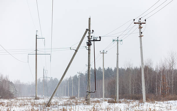 istock A pole with a broken top is leaning to the right 2240696741