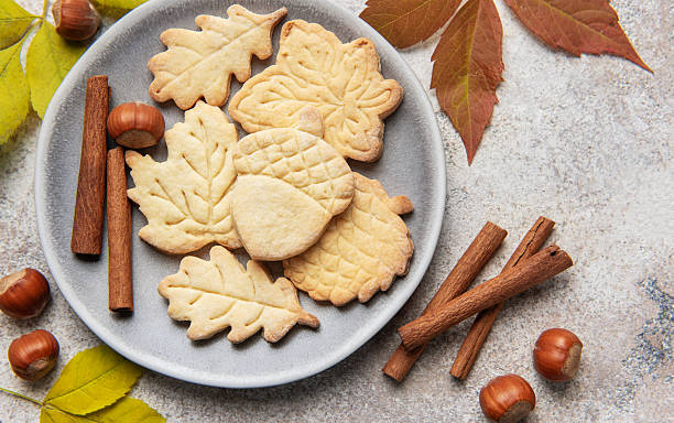 istock Autumn cookies on plate with cinnamon and hazelnuts 2240698192