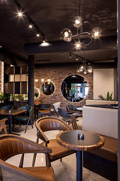 istock Stylish modern restaurant interior with cozy seating 2240703916
