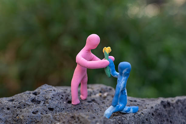 His friend who is trying to save his friend who is under the pain of love and the cruel woman who watches them. / You can see the animation movie of this image from my iStock video portfolio. Video number: 2191177448