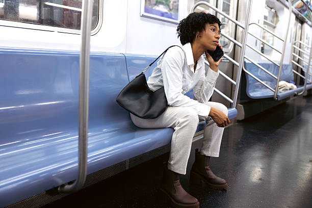 istock Female professional enjoying quiet train ride to work 2240704536
