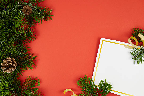 istock christmas greeting card background with fir tree decorations 2240708077