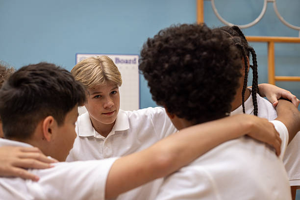 istock Teens Having a Pep Talk in PE 2240708624