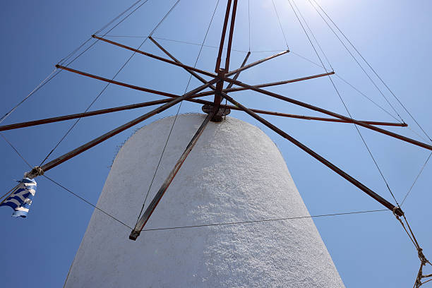 Traditional white windmill in Oia on the island of Santorini. Cyclades, Greece
