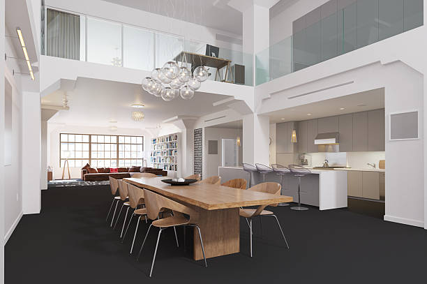 istock Modern open-plan loft apartment interior. Spacious dining room, kitchen, and living area with mezzanine. Luxury real estate and contemporary home design concept 2240710722