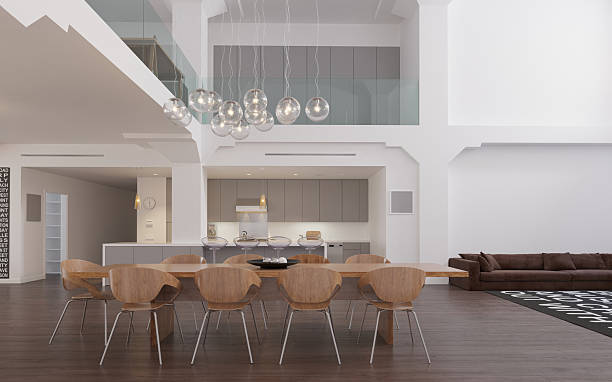 istock Spacious open-plan interior of a modern loft apartment. Dining room and kitchen in a luxury contemporary home. 3d rendering image 2240710753