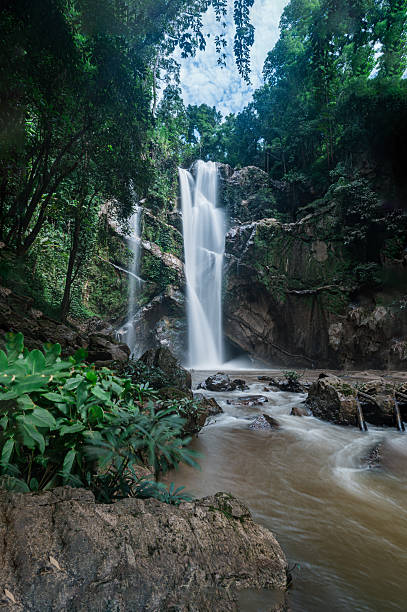 istock Majestic Waterfall in Chiang Mai Surrounded by Lush Greenery 2240711095
