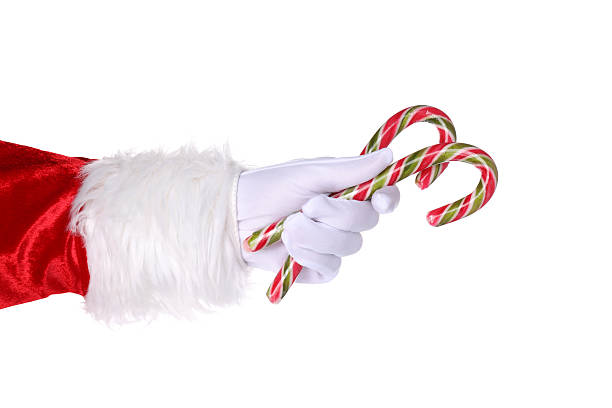 istock PNG, Santa's hand with candy, isolated on white background 2240713000