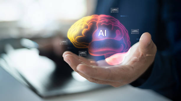 istock A businessman holding a glowing AI brain hologram representing artificial intelligence, innovation, and future technology for digital transformation and data analysis. 2240714032