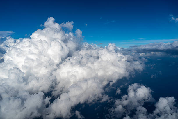 istock Aerial view of fluffy clouds over the Pacific Ocean in Polynesia 2240714773