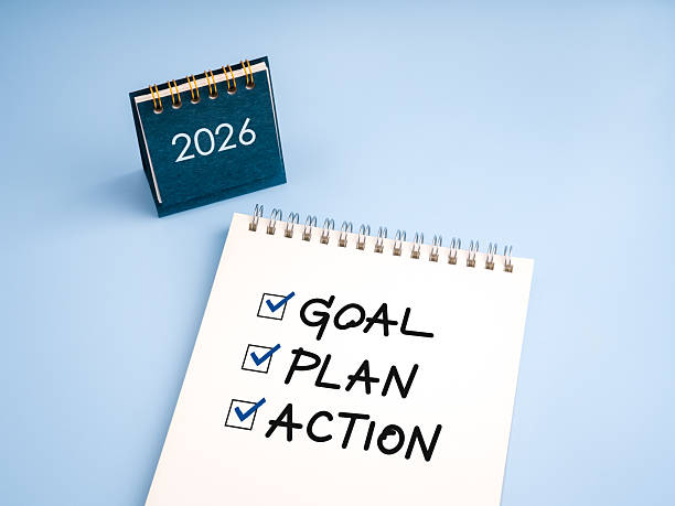 istock Notepad with checklist marked Goal, Plan, Action next to calendar showing 2026 on blue background, symbolizing new year planning, goal setting, business strategy, productivity, and resolution. 2240723275