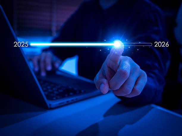 istock Businessman touching digital progress bar from 2025 to 2026 on virtual screen in blue tone. Concept of future technology, innovation trends, digital transformation, and new year tech development. 2240723305