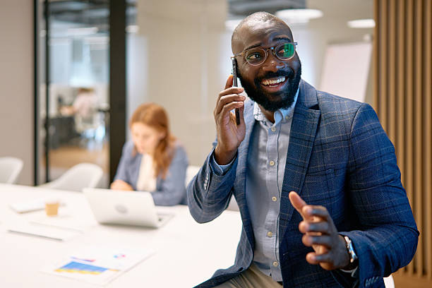 istock Male professional having phone call in modern office 2240725075