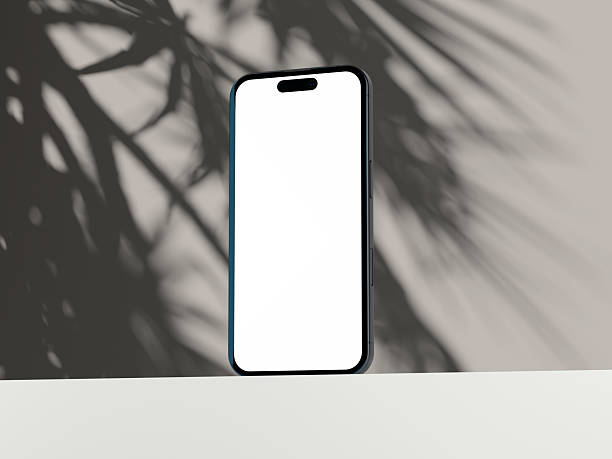 istock Sleek phone screen mockup with a minimalist background and dramatic shadow play. 2240725153