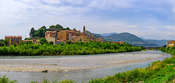 Ventimiglia Alta seen from the other side of the river Roya in the province of Imperia, Liguria, northern Italy during a springtime day.