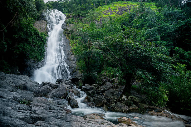 istock Serene Waterfall Sarika Flowing Through Lush Forest in Thailand's Mountains 2240730948