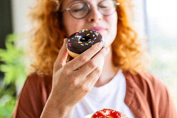 istock Redhead Lady Indulging in Delicious Dessert 2240732257