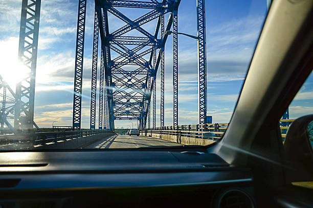 istock car traveling over the bridge 2240736207
