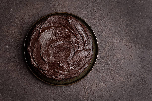 istock Chocolate brownie cake with chocolate ganache topping 2240737378