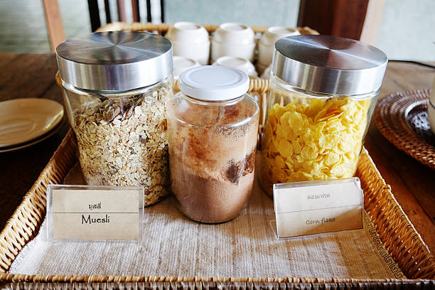 istock Various uncooked cereals with muesli and corn flake in glass jar on table 2240742454