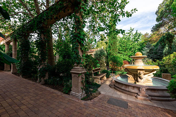 istock A courtyard with a fountain and a bench 2240744031