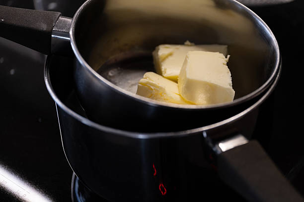 istock Butter melting in saucepan on stovetop 2240745206