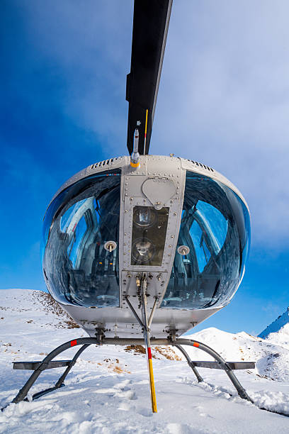 A photo of an helicopter on the snow