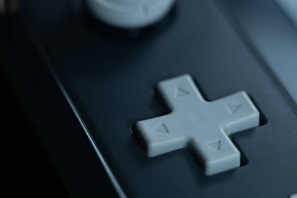 Close-up view of game controller texture and letters.