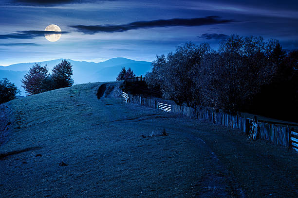 istock mountainous rural landscape in autumn at night 2240746674