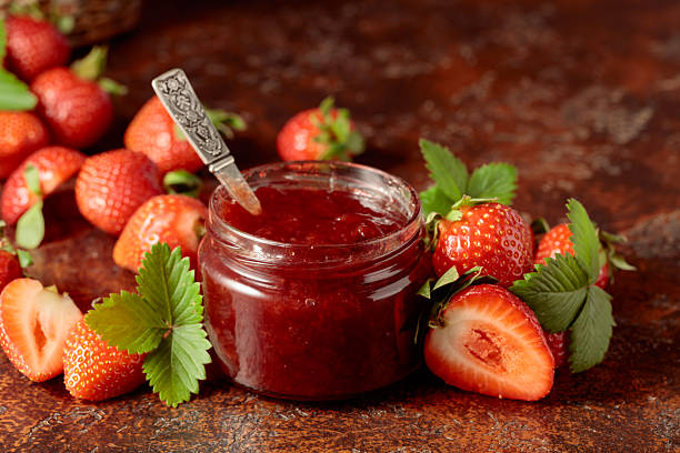 istock Strawberry jam and fresh berries. 2240750099