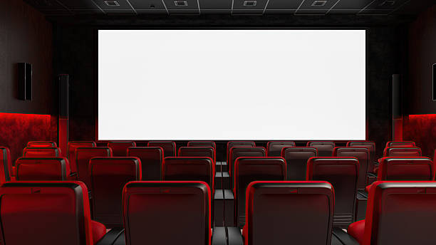 istock Empty Cinema Auditorium with Red Seats and Blank Wide Screen Mockup 2240761913