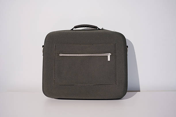 istock Stylish grey laptop bag with zipper pocket on a white background 2240767943