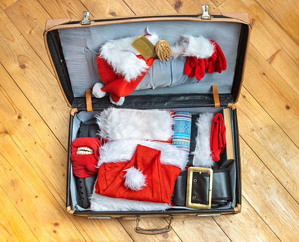 istock An open suitcase with Santa Claus equipment 2240770829