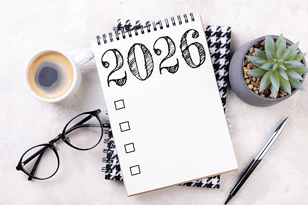istock New year goals 2026 on desk. 2026 resolutions list with notebook, plant on table. Resolutions, plan, goals, action, checklist, idea concept. New Year 2026 resolutions 2240773723