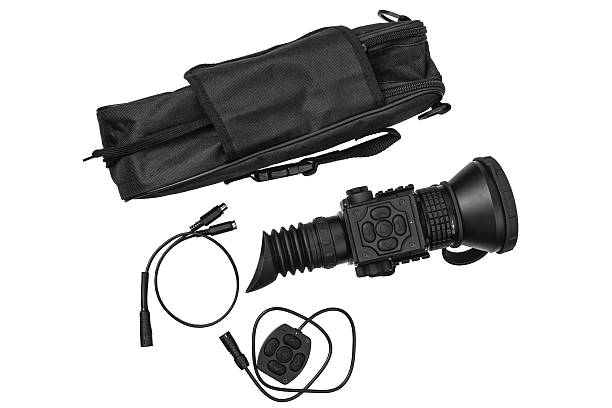 istock Black thermal or night vision rifle scope with a rubber eyecup and mounting rail. 2240777325