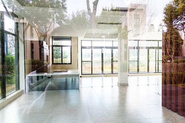 Modern contemporary loft empty room with open door to garden 3d render The Rooms have concrete tile floors
